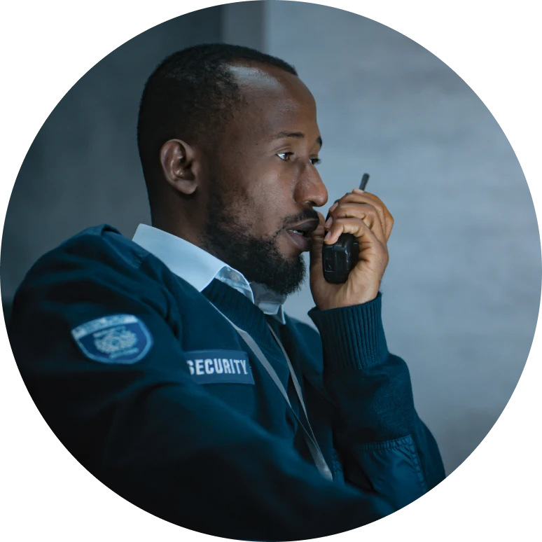 Man in uniform with communication device