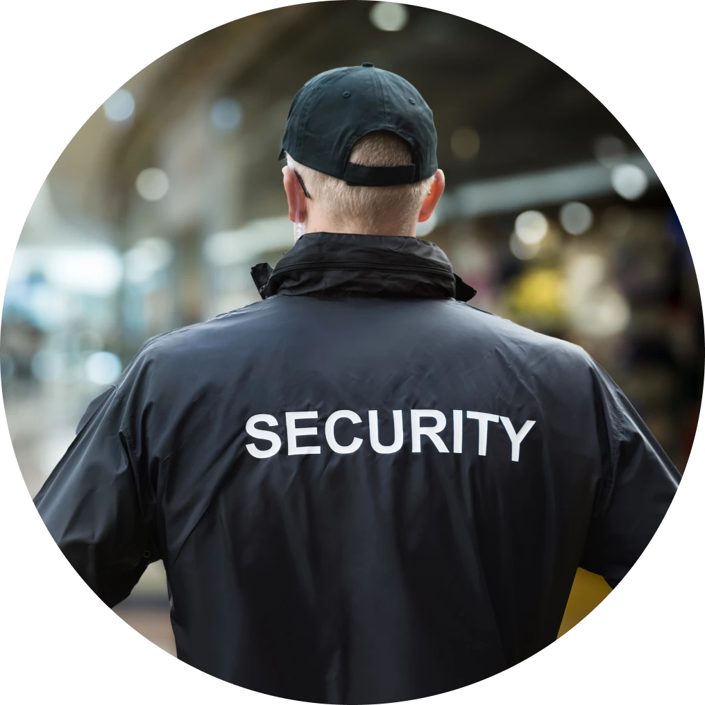 Guard wearing a black security jacket